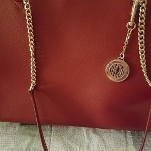 DKNY red purse, very good condition. Used once, go